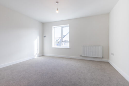 The master bedroom with en-suite bathroom in The Lindale, new build home at Meadow Rigg in Kendal - Genesis Homes
