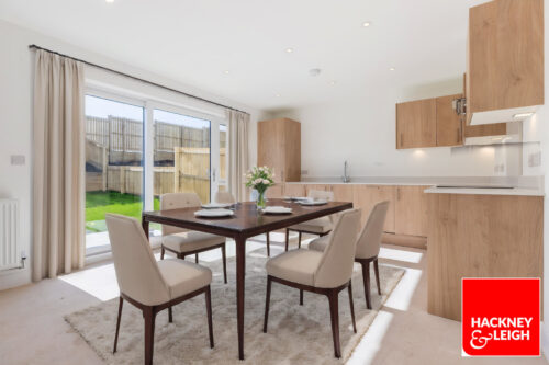CGI furniture in the open plan kitchen in The Clawthorpe, a 3-bedroom home at Meadow Rigg, Kendal - Russell Armer Homes