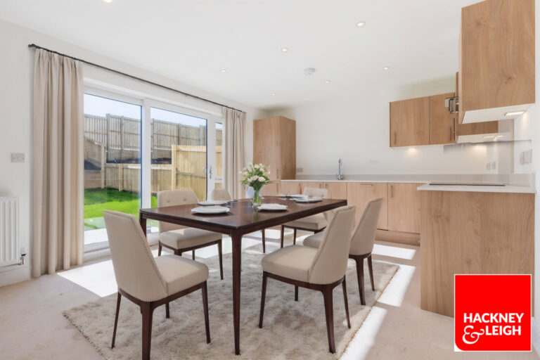 CGI furniture in the open plan kitchen in The Clawthorpe, a 3-bedroom home at Meadow Rigg, Kendal - Russell Armer Homes