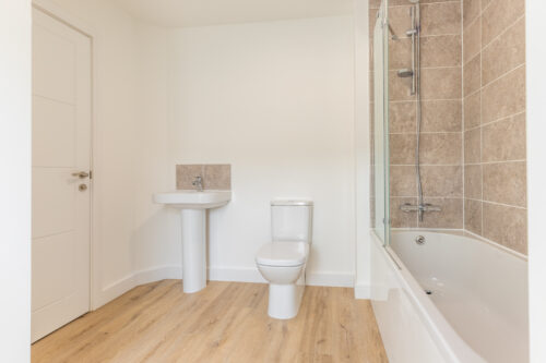 The Aspley family bathroom - new build home, Russell Armer by Genesis Homes