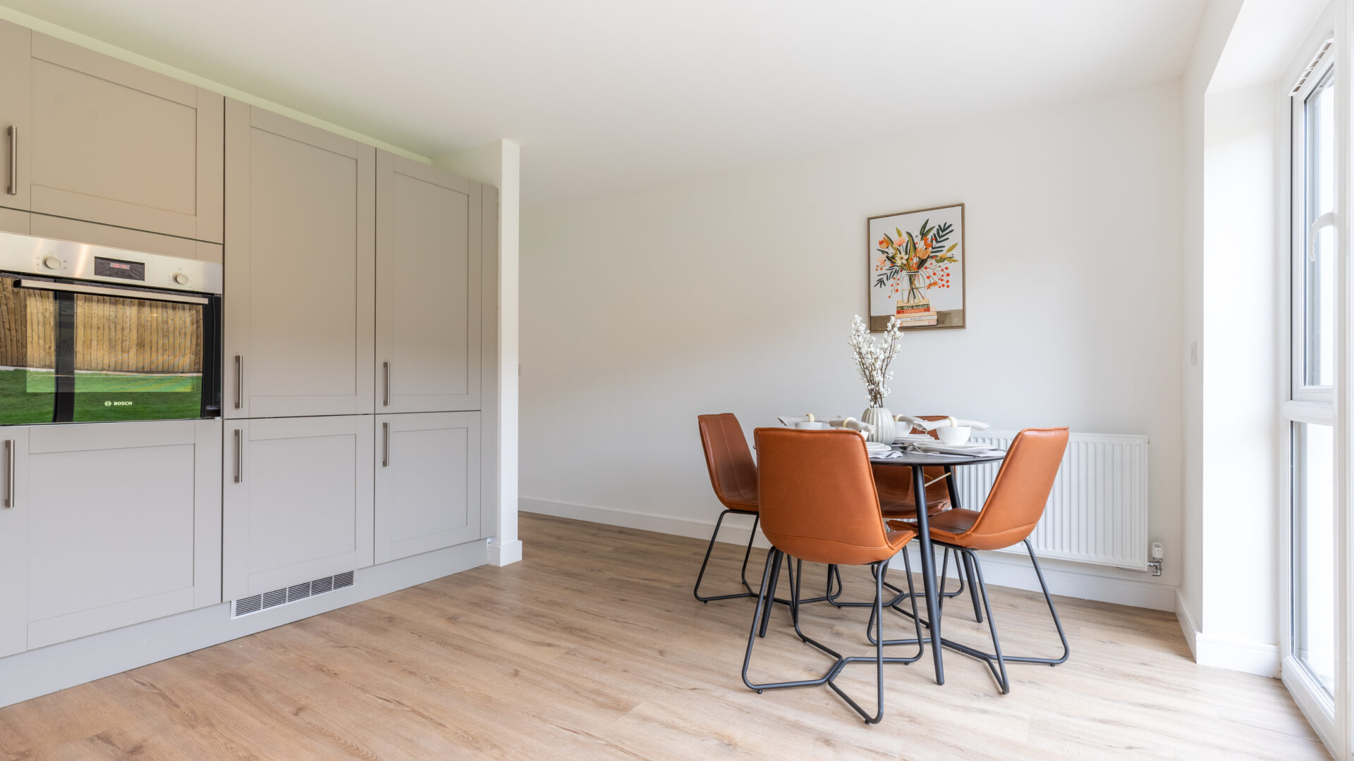 The Aspley kitchen/dining area - new build home, Russell Armer by Genesis Homes
