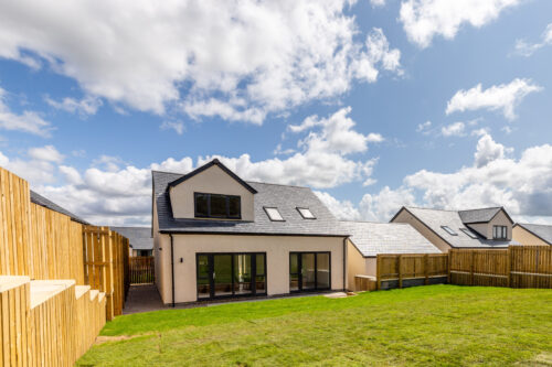 The Aspley exterior and rear garden - Russell Armer by Genesis Homes