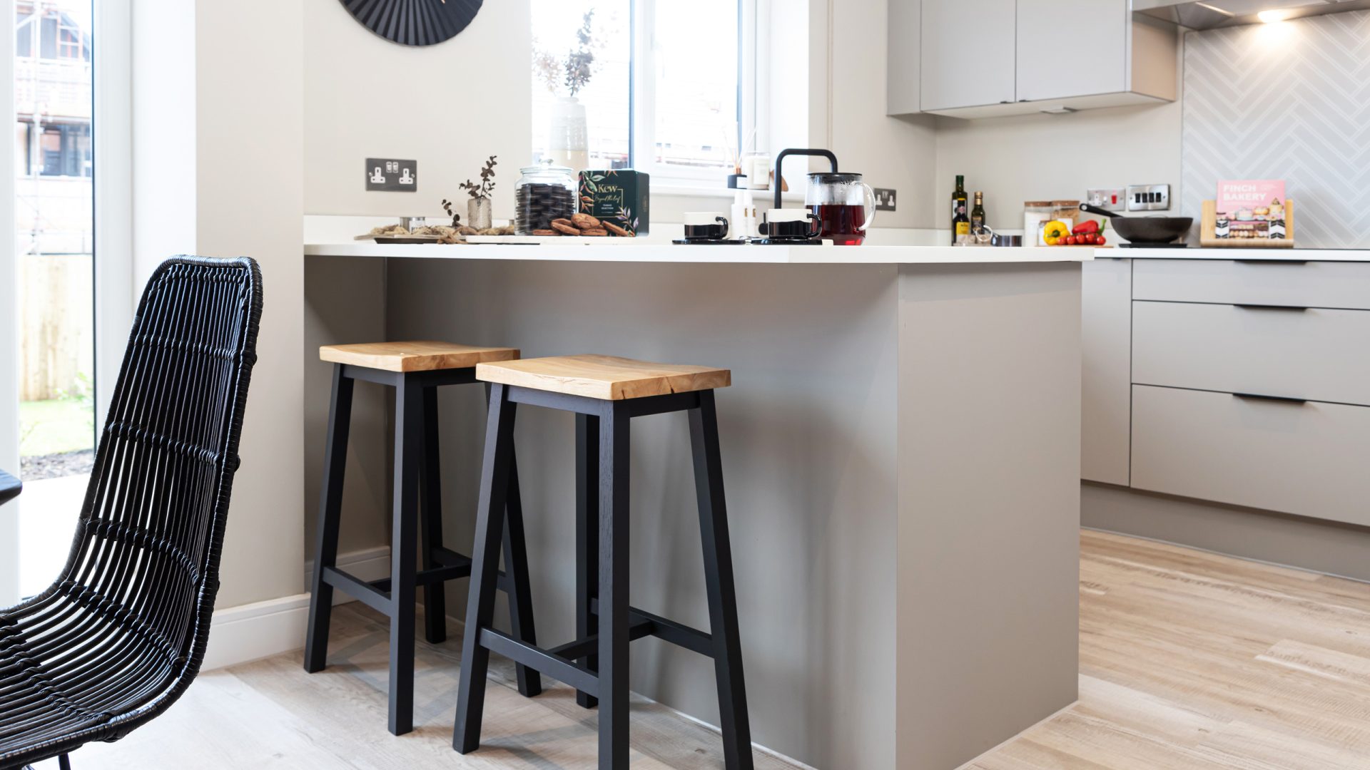 Modern kitchen with breakfast bar in a Genesis Homes new build house