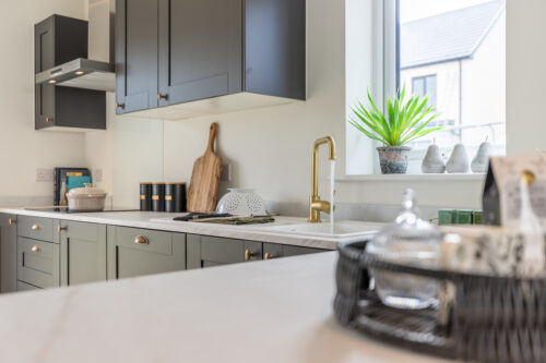The open plan kitchen/dining area in the 3-bedroom Sedgwick at Meadow Rigg in Kendal - Genesis Homes