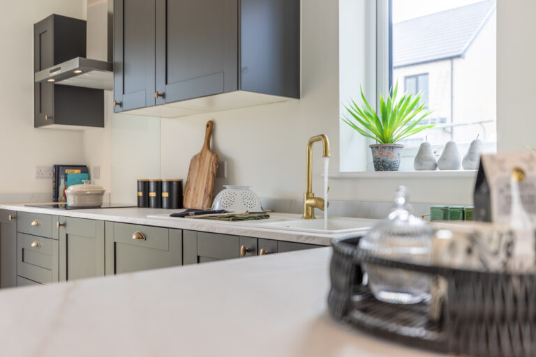 The open plan kitchen/dining area in the 3-bedroom Sedgwick at Meadow Rigg in Kendal - Genesis Homes