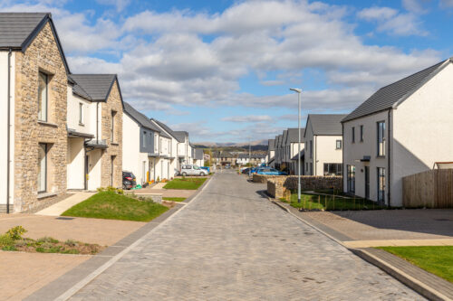 Street scene image of new build development, Meadow Rigg in Kendal - Russell Armer by Genesis Homes
