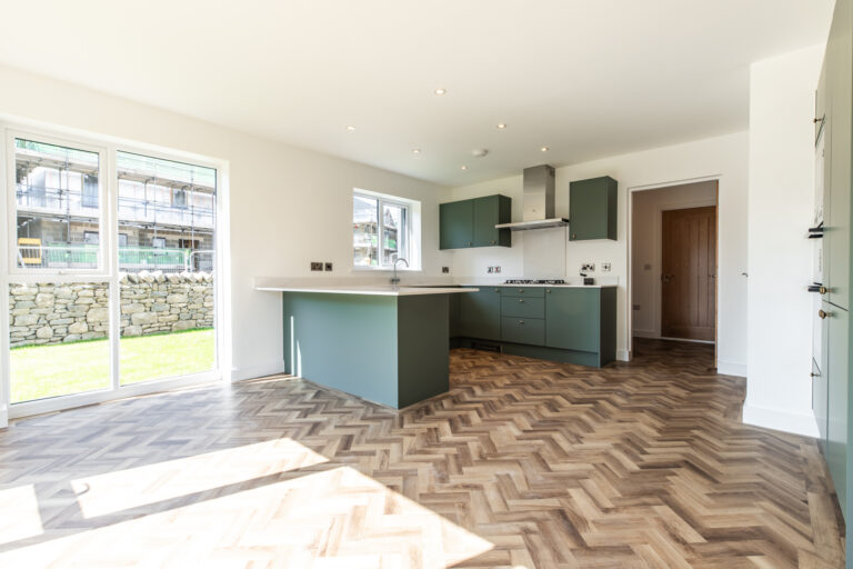Open plan kitchen/dining area in The Bowston new build home - Russell Armer Homes