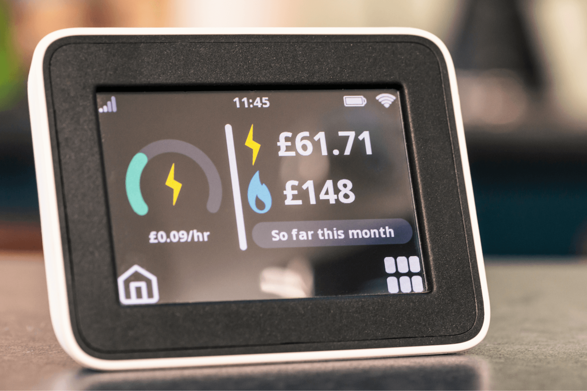 Close up of a smart meter showing energy usage and bill amount