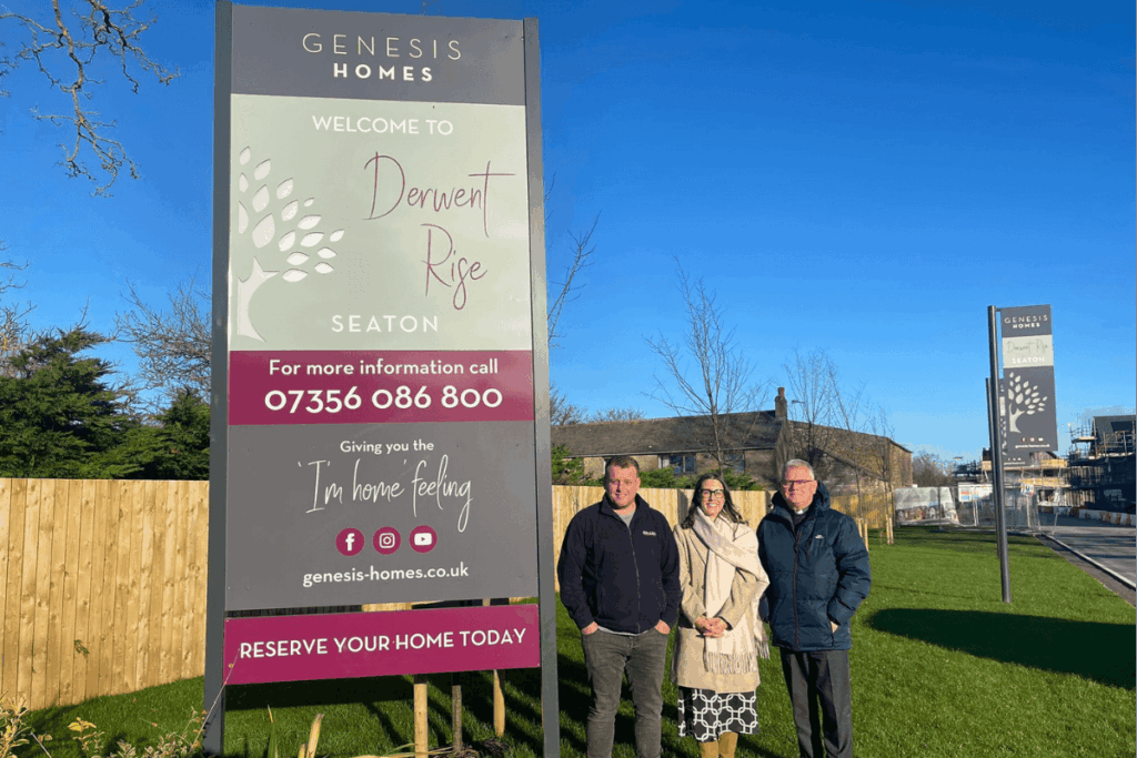 Genesis Homes team stood outside the development at Derwent Rise in Seaton