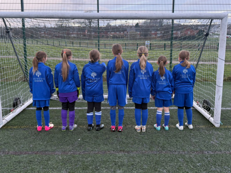 Penrith AFC girls team with their Genesis Homes sponsored kit