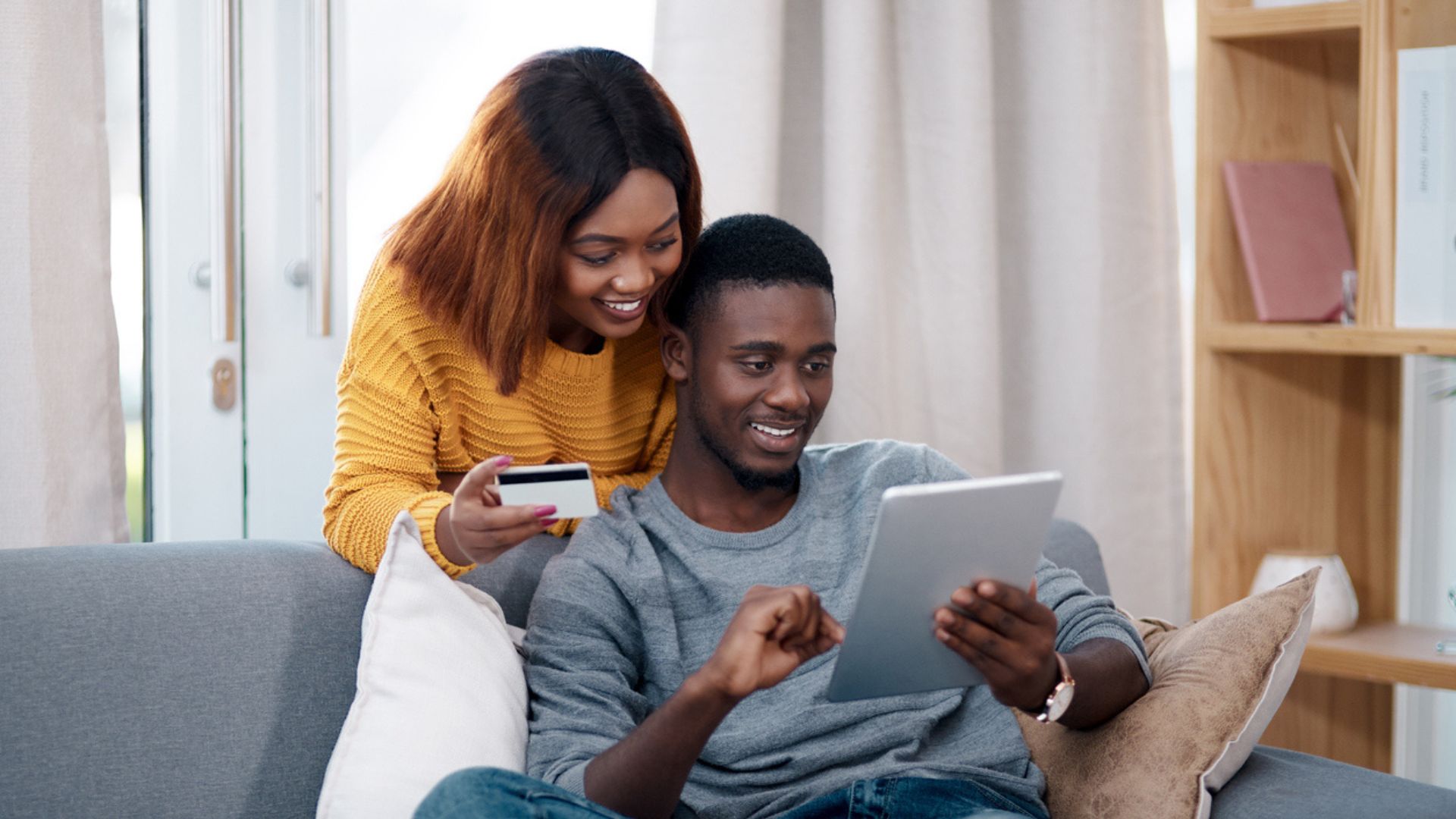a couple opening a savings account to save for a house deposit