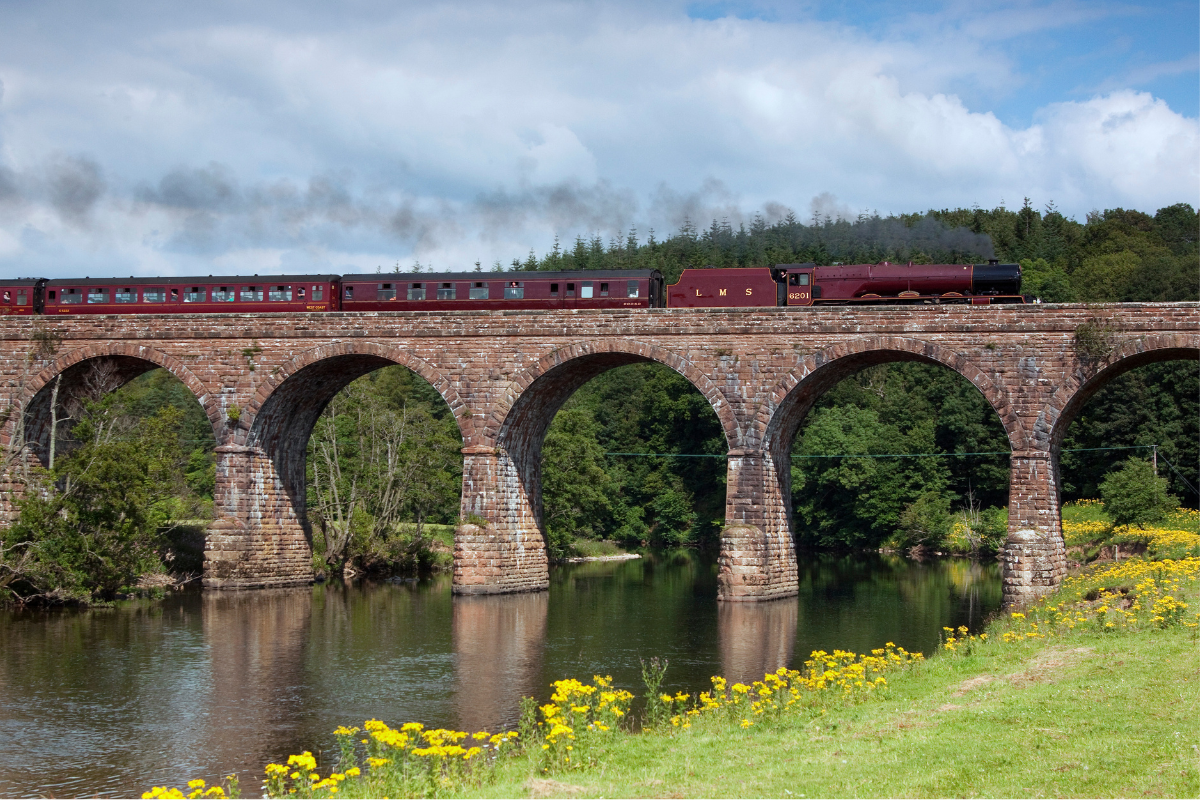 Preserved steam locomotive 6201 Princess Elizabeth heads the Cumbrian Mountain Express over Long Meg Viaduct, on the Settle to Carlisle railway