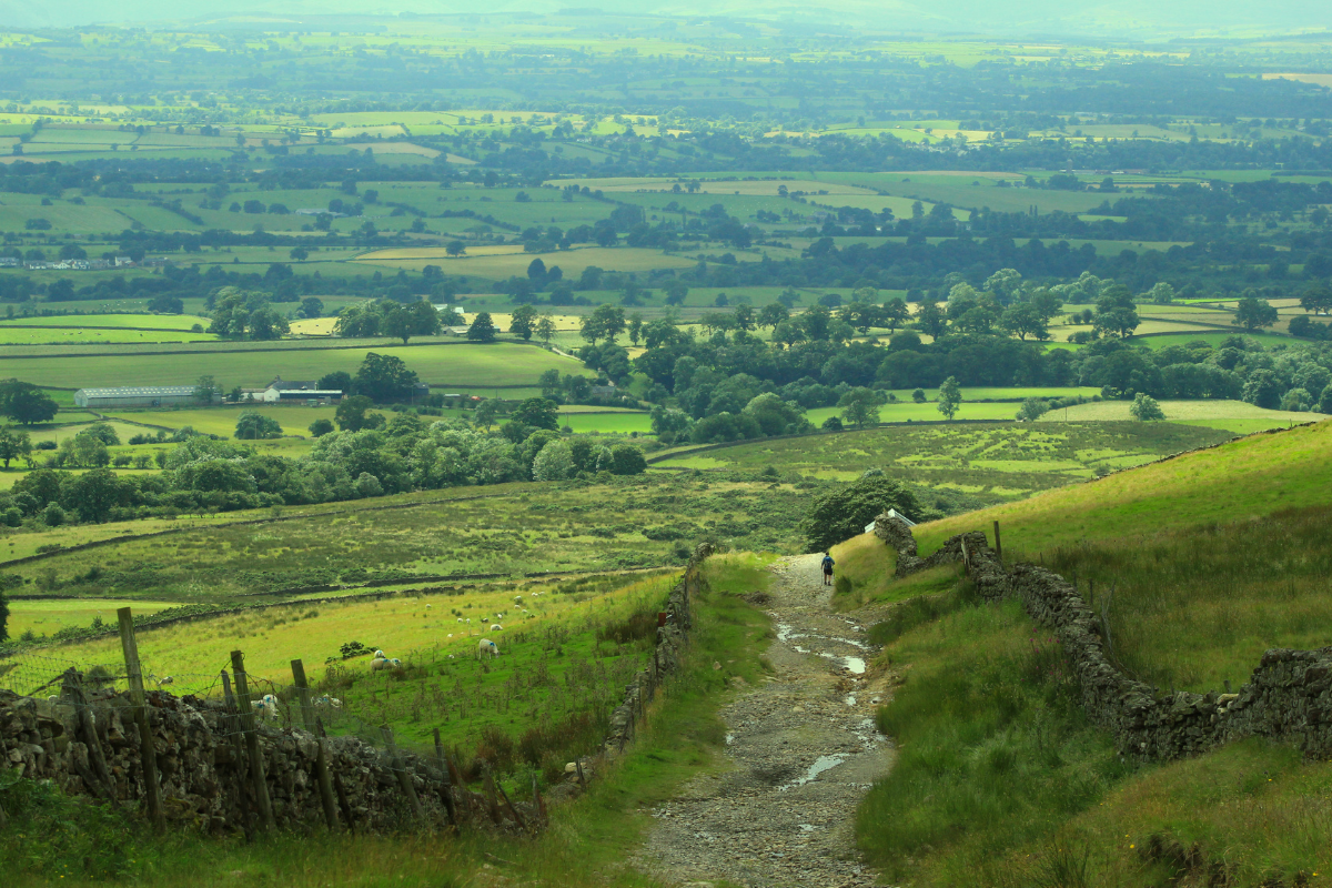 The path descending from High Cup to Dufton, with views of the Eden Valley.