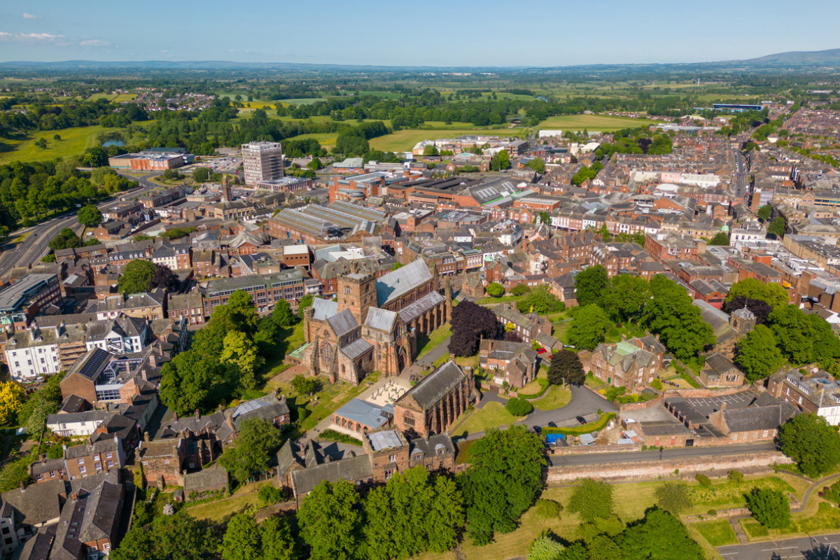 This aerial drone photo shows a large church in the town of Carlisle. Carlisle is a town in Cumbria, North-West England.