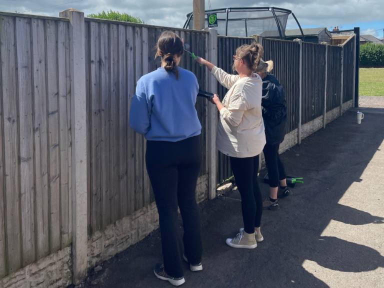 Genesis Homes team backs Give a Day to the City initiative