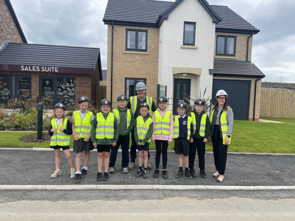 Genesis Homes hosting a site visit with St Paul's School in Seaton