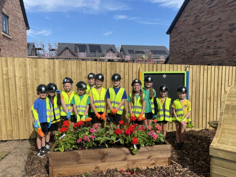 Young gardeners help plant the seeds of community at Sandsfield Way